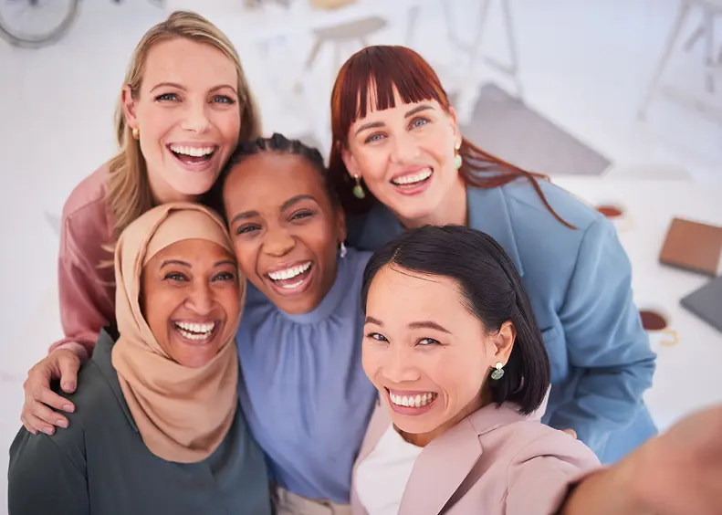 Group of women smiling together